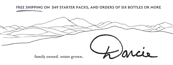 line drawing of mountains and 'Darcie'